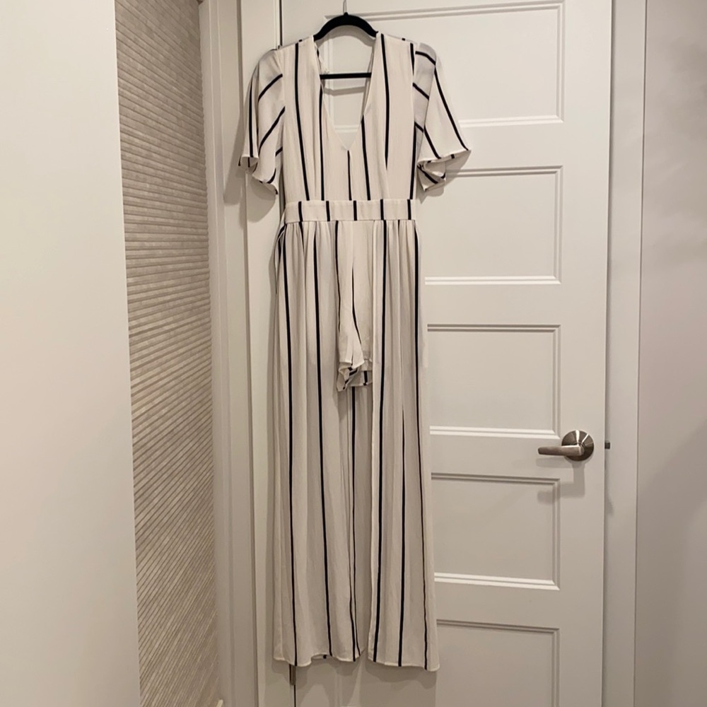 Fun black and white romper with cape